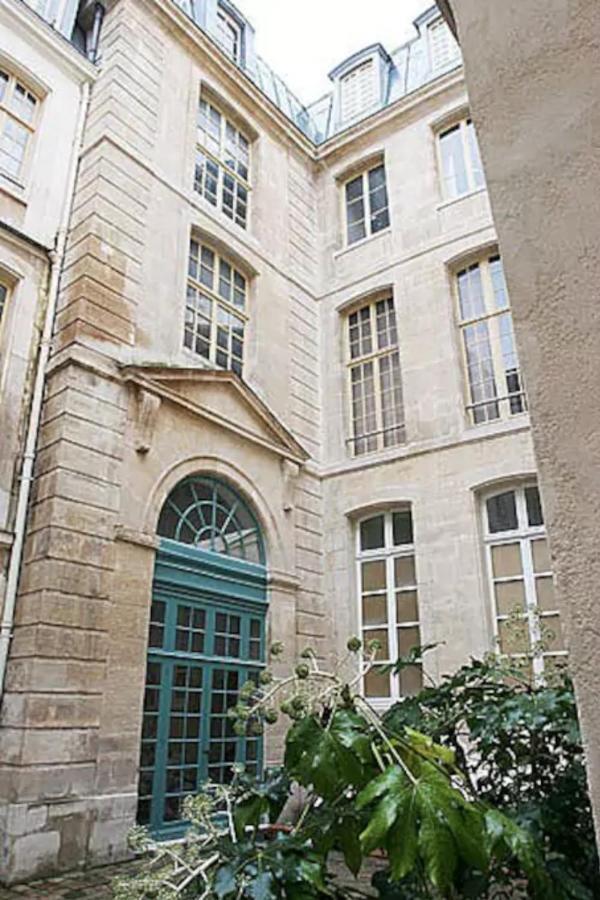 Appartamento Charming Cosy Triplex In Trendy Marais Parigi Esterno foto