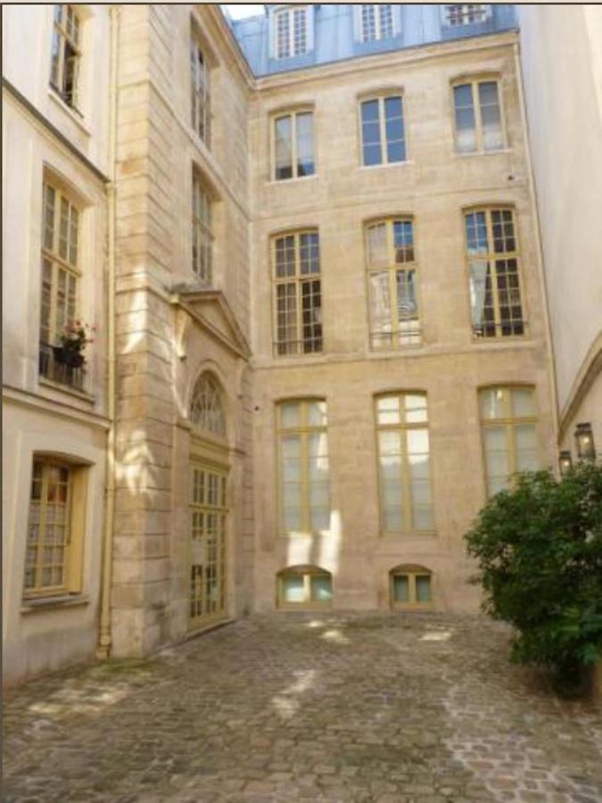 Appartamento Charming Cosy Triplex In Trendy Marais Parigi Esterno foto